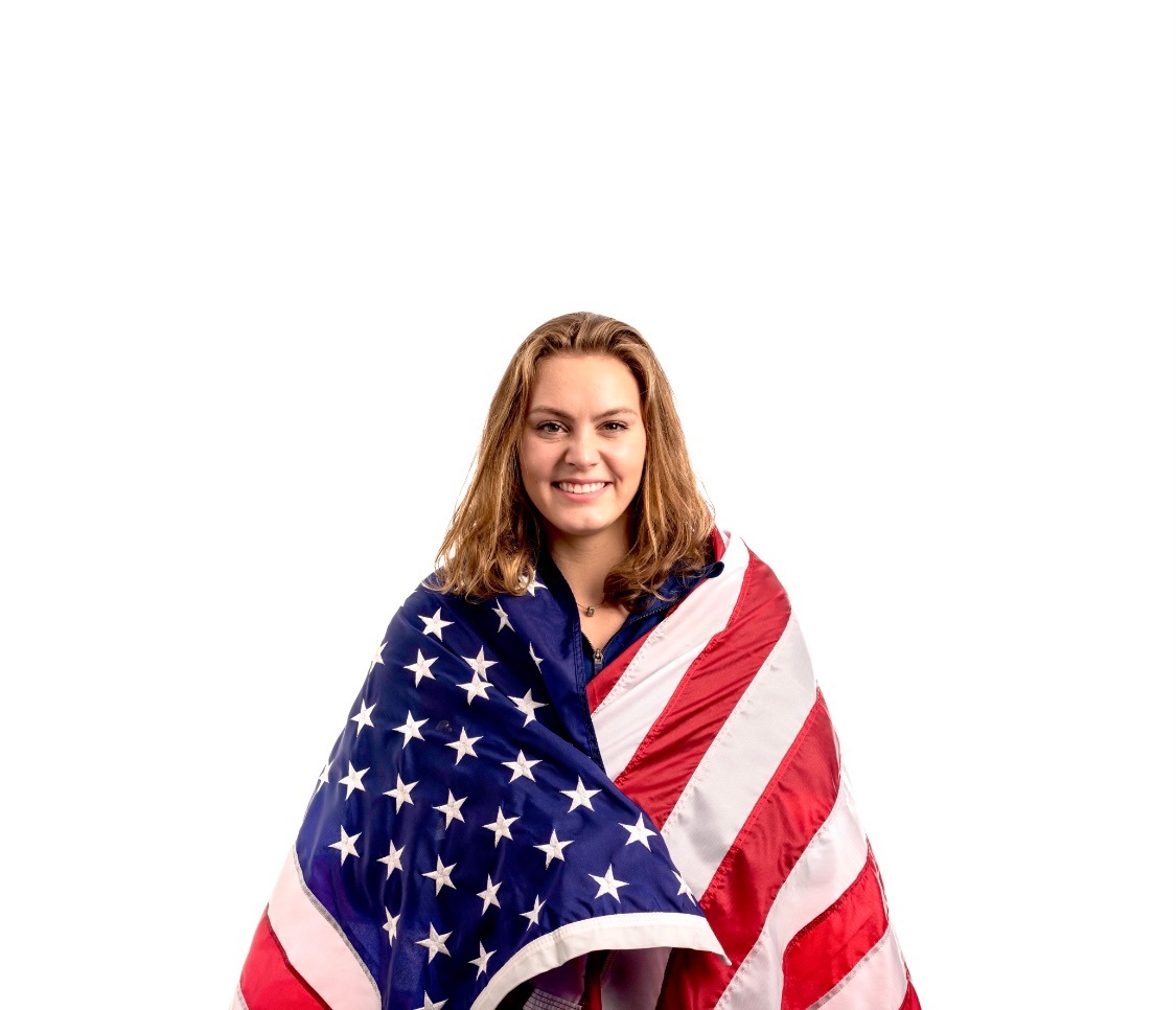 Olympian and TXADPR Student, Alison Gibson, draped with an American flag!
