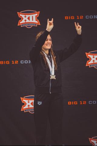 Alison Gibson with Big 12 medal