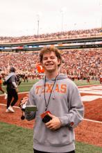 Tomas Minc standing on the DKR field 