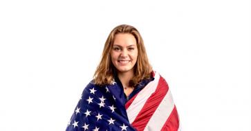 Olympian and TXADPR Student, Alison Gibson, draped with an American flag!