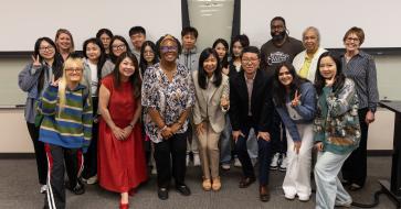 Visiting professor with her grad students, and UT faculty in the back