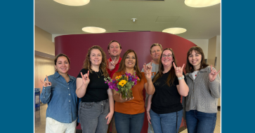 Photo of staff with Sid Carrizales