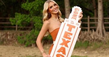 Cropped image of Alexis Fuetsch holding Texas sign