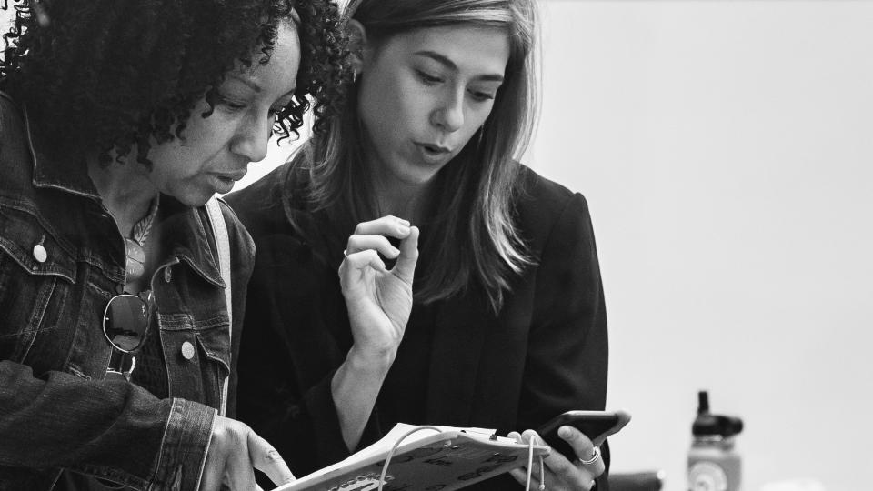 Erica Laible going over lines with marketing producer