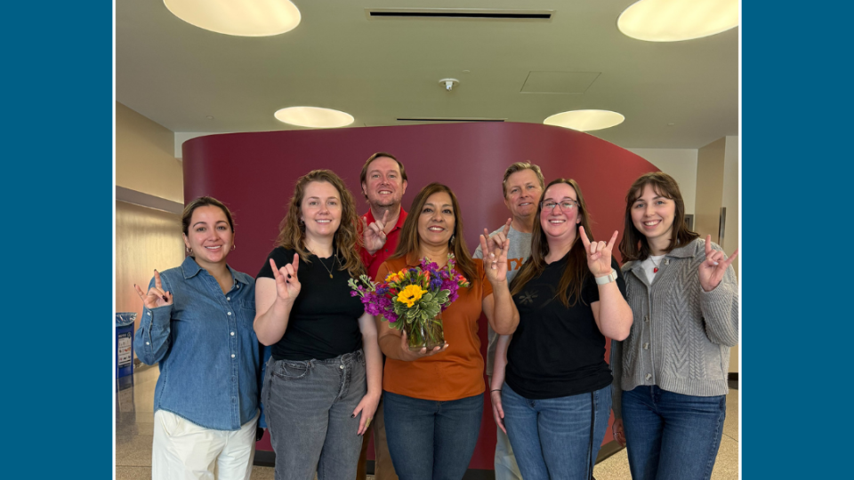 Photo of staff with Sid Carrizales