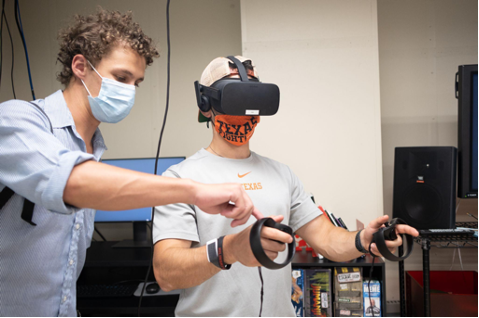 Two students testing out VR headset