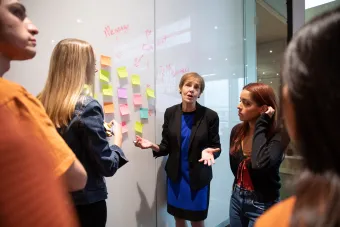 mimi talking to students